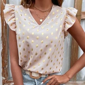 Women’s gold spotted blouse